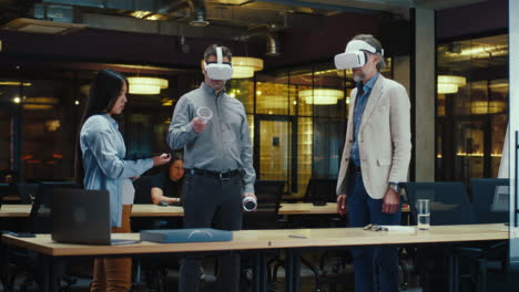 business team using virtual reality headsets in the office