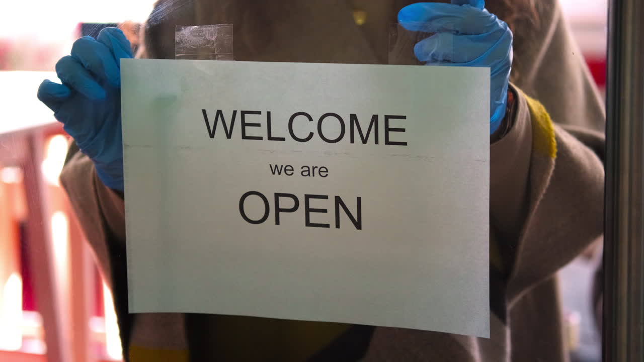 signo de reapertura de la tienda