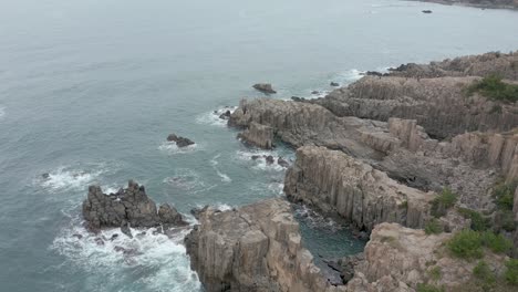 tojinbo cliffs, fukui prefecture japan. aerial flyover