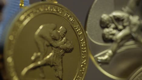 close-up of judo medals