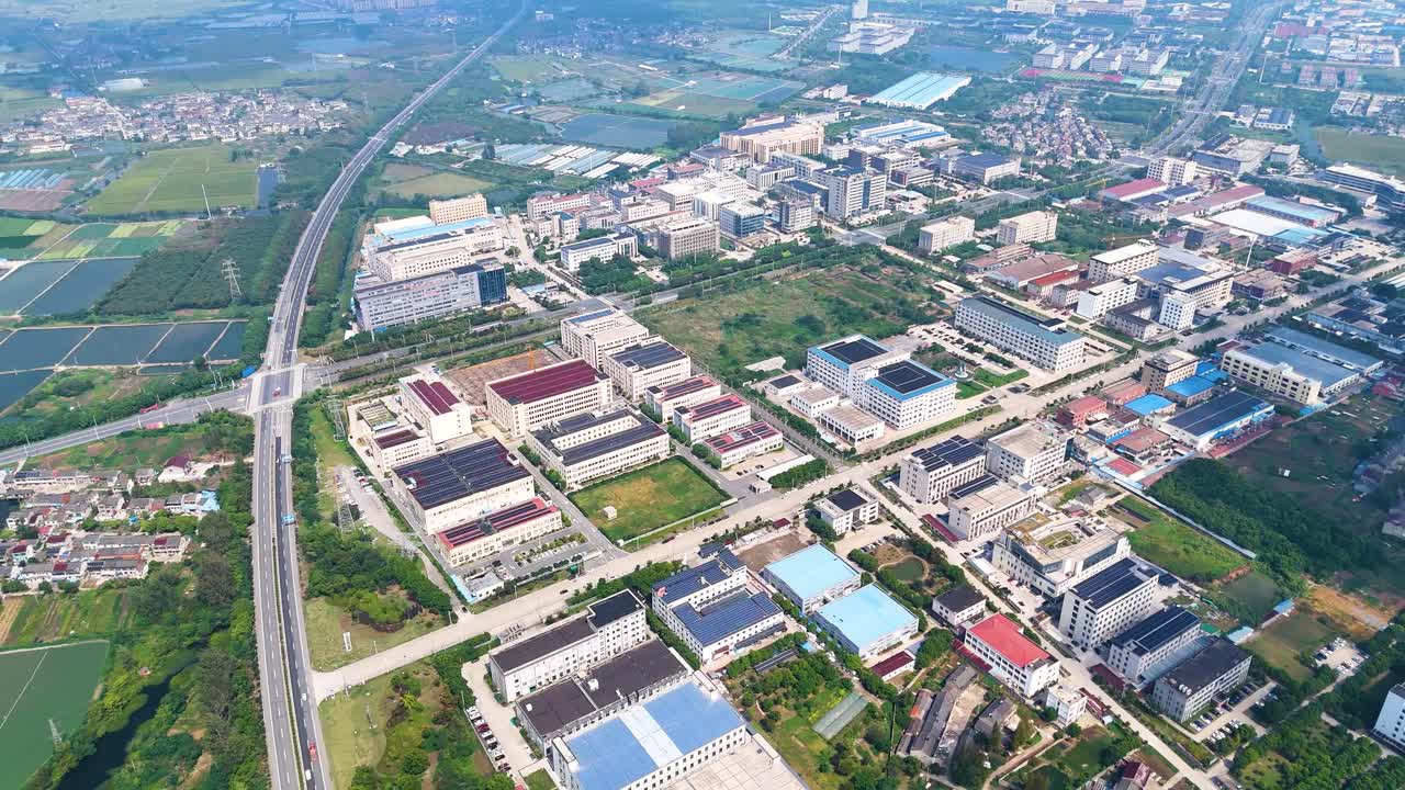 Pullout aerial view of Glasses and Sunglasses Factories in Danyang City, Jiangsu Province, China