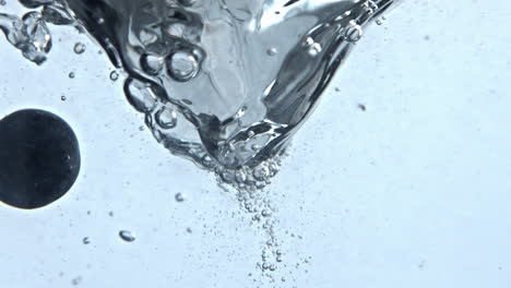 detox liquid berries swirling clean vessel closeup. carbonated cocktail funnel