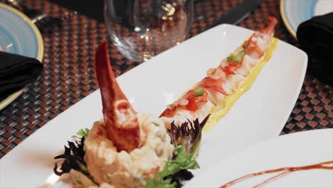 Dish-of-a-seafood-appetizer-on-the-table-freshly-served-in-a-fancy-restaurant