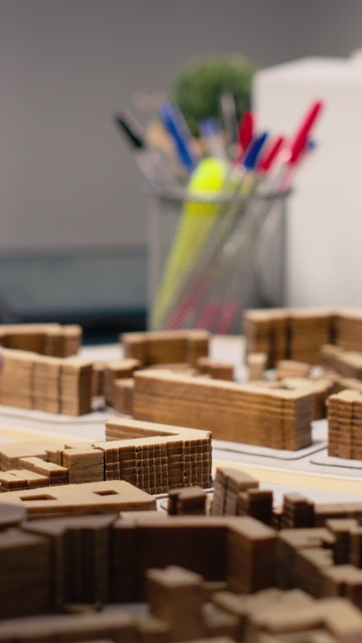 Vertical Video Close up of urban developers showing master plan for residential layout project