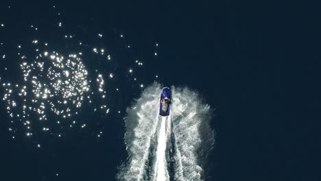 Aerial-cenital-plane-shot-of-a-jet-ski-in-Cabo-Pulmo-National-Park,-Baja-California-Sur