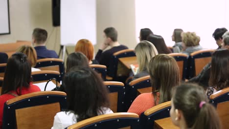 Audience Listens In A Conference Hall. VINNITSA, UKRAINE, APRIL 2017: Students are listening to teacher speech attentively
