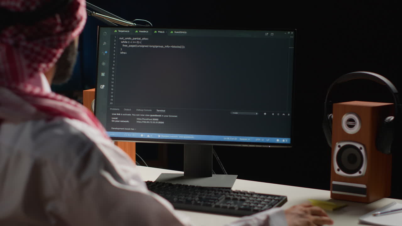 Engineer writing code at home