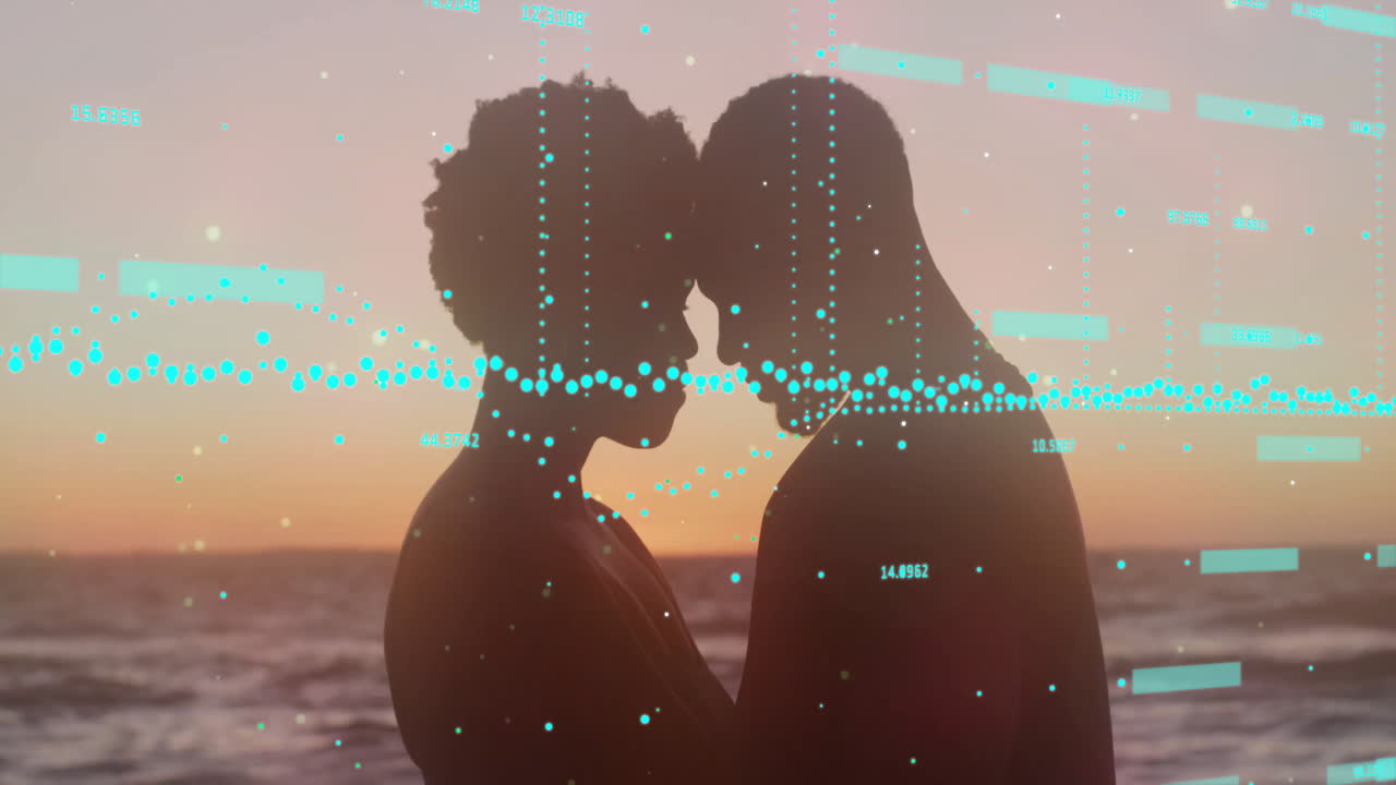 Silhouetted couple embracing at sunset with digital data overlay animation