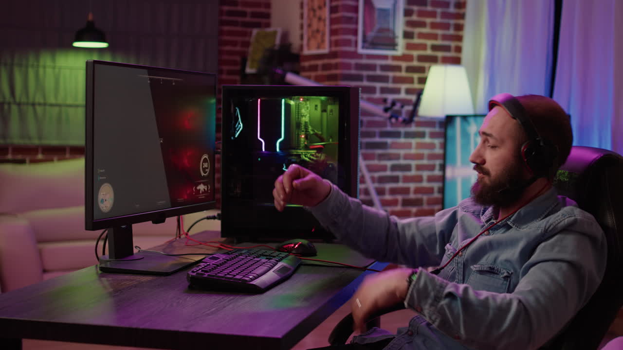 Man playing online first person shooter angry after losing online competition on gaming pc