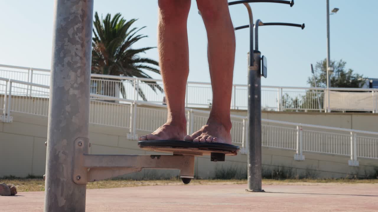 Person Balancing on Outdoor Exercise Platform