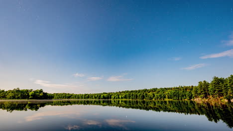 A-nightime-timelapse-during-a-bright-full-moon-with-unique-clouds-and-reflections