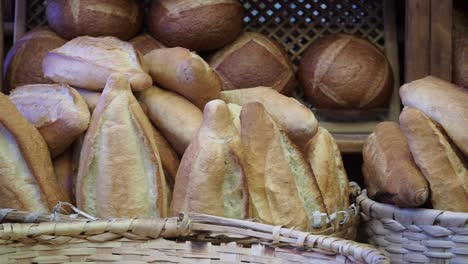 assortment of freshly baked baguettes in baskets