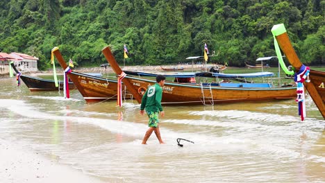 longtail boats on a tropical beach