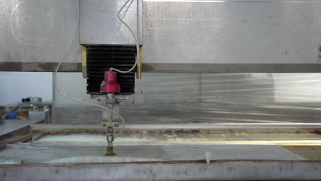 working process of cutting parts by water-jet cutting machine in the workshop
