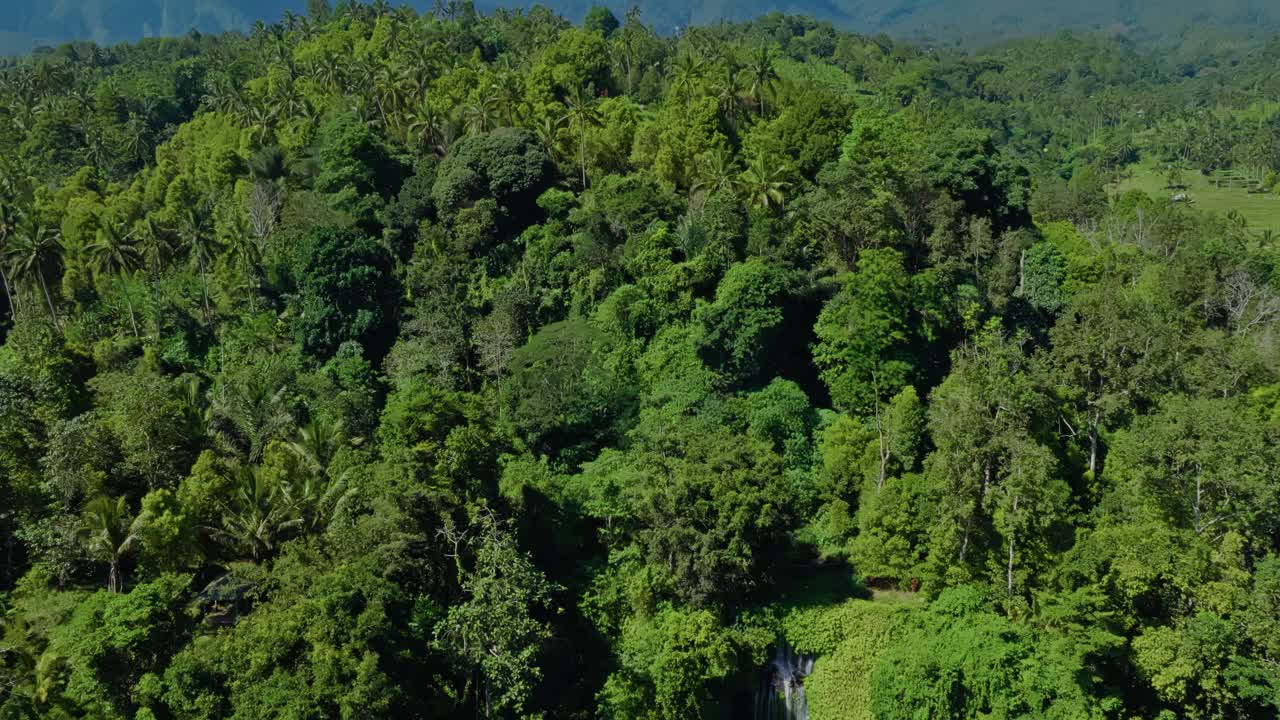 Aerial descend reveal, twin waterfalls tourist landmarks, Indonesia