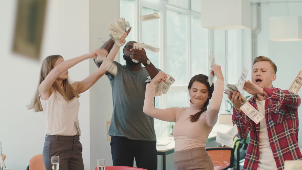 Happy people making rain with money. Cheerful people throwing dollar banknote.