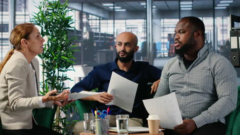 vertical video group argument in a corporate office between diverse professionals