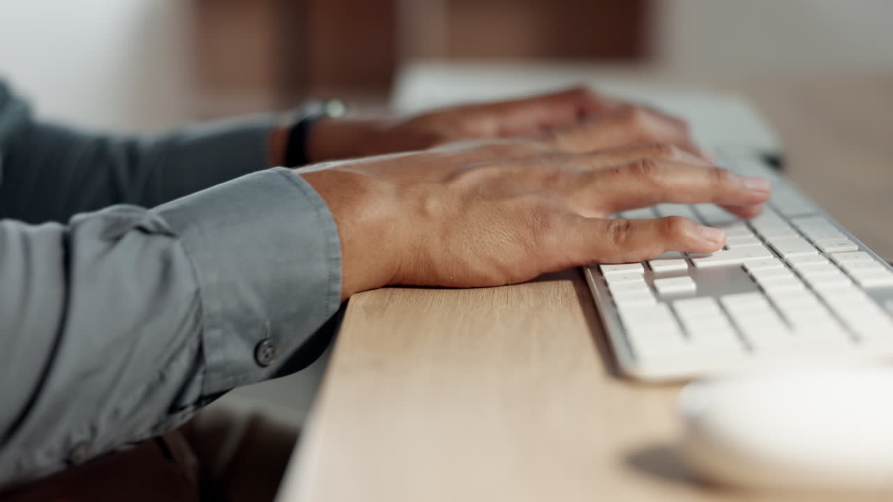 Woman hands typing on keyboard at night for email