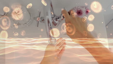 animation of macro coronavirus covid-19 cells spreading over caucasian woman washing her hands