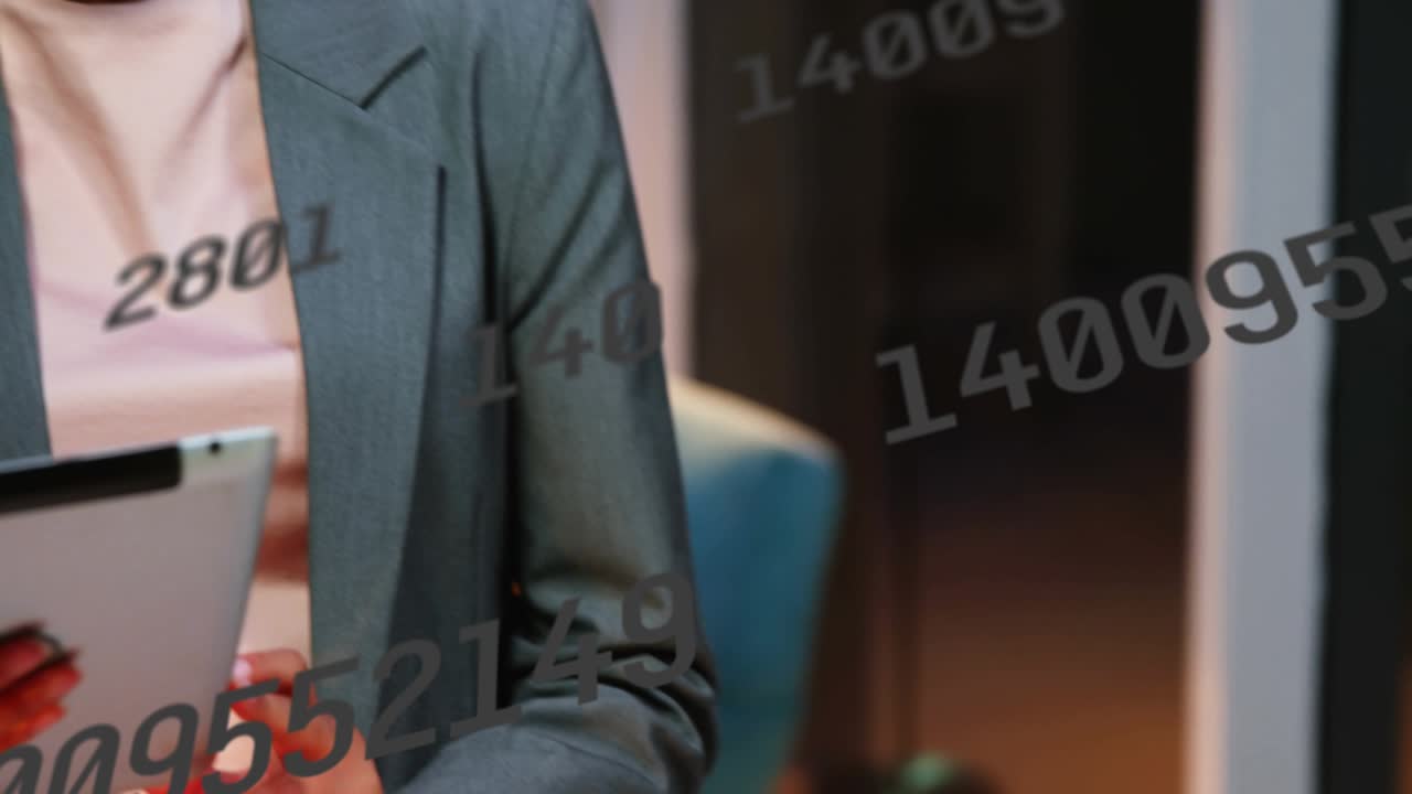 Coworkers holding tablet, tapping and causing badges, leaning together analyzing social metrics