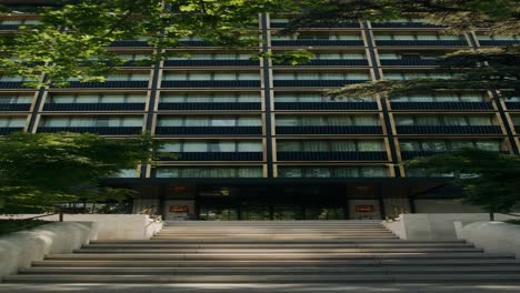 modern hotel entrance with lush landscaping