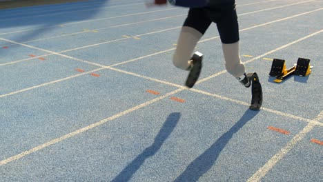 Disabled-athletic-running-on-a-running-track-4k