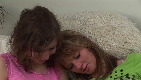 two young women on a sofa