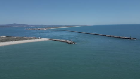 Aerial-seascape-view-of-Ilha-deserta-,-one-of-the-barrier-islands-that-protect-the-Ria-Formosa-natural-park,-in-Algarve-Tourism-Destination-Region,-in-Portugal-south-coast