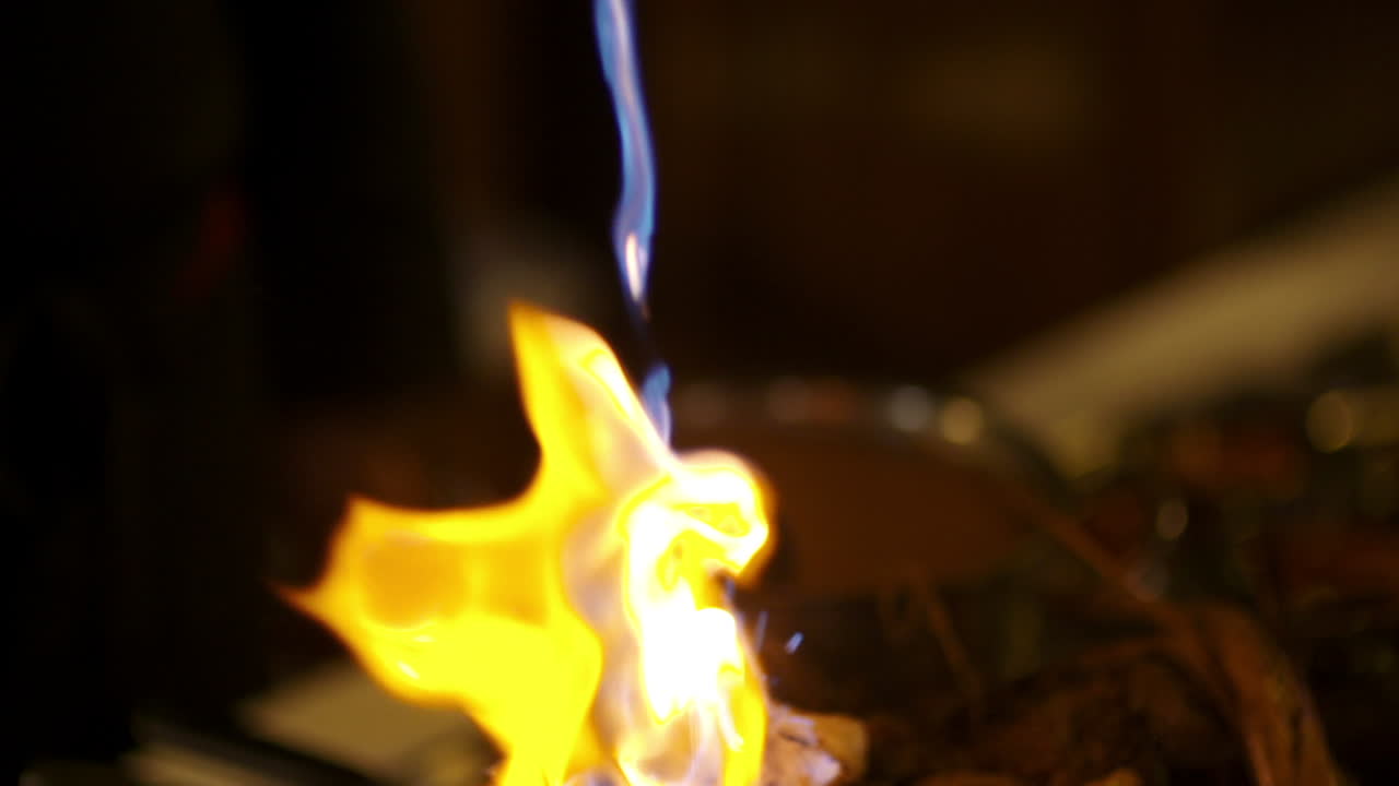 Close Up Of Flaming Meat Dish Spectacularly Served