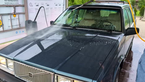 washing a volvo classic car at a self service car wash