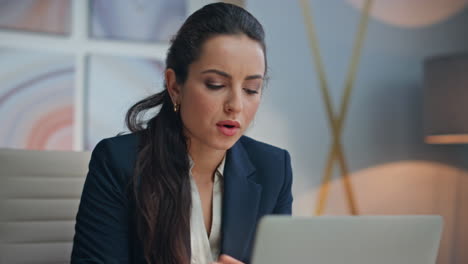 busy manager doing paperwork in modern office closeup. smiling woman reading