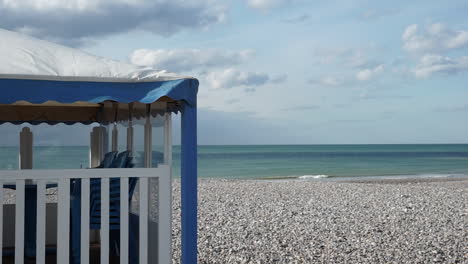 Closed-restaurant-on-a-sunny-and-empty-beach