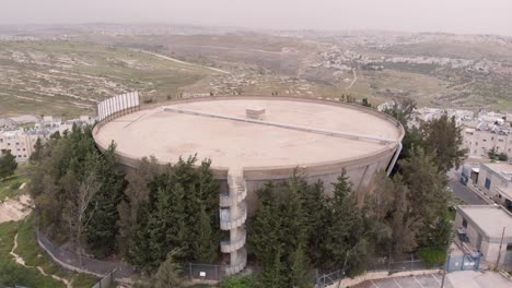 aerial view of a water tower in a residential area