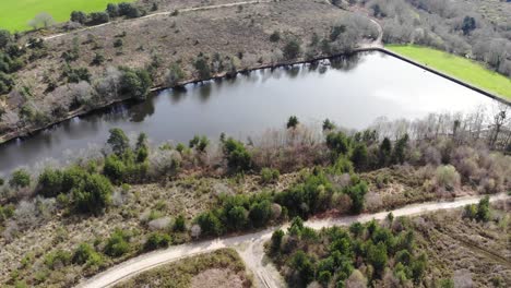 Calm-Squabmoor-Reservoir-Located-In-Woodbury-Common