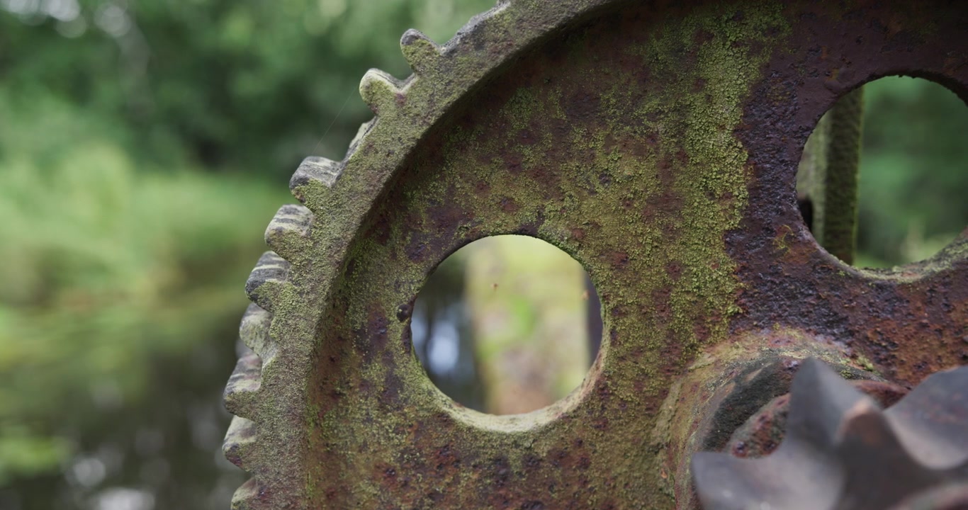 Stationary close up shot of rusty old mill machinery. Shot on Red Epic at 5K.