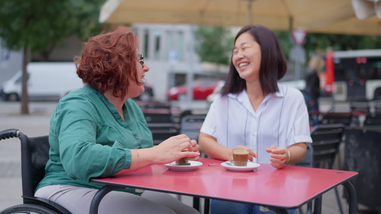 Friends enjoying coffee at an outdoor cafe