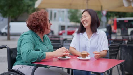 friends enjoying coffee at an outdoor cafe