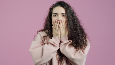 surprised woman with curly hair