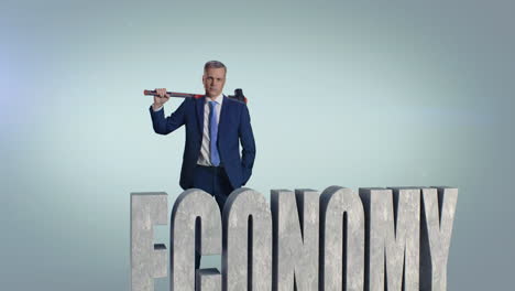 middle aged businessman breaking economy inscription zoom out view of mature man in suit hitting stone economy inscription with hammer against gray background