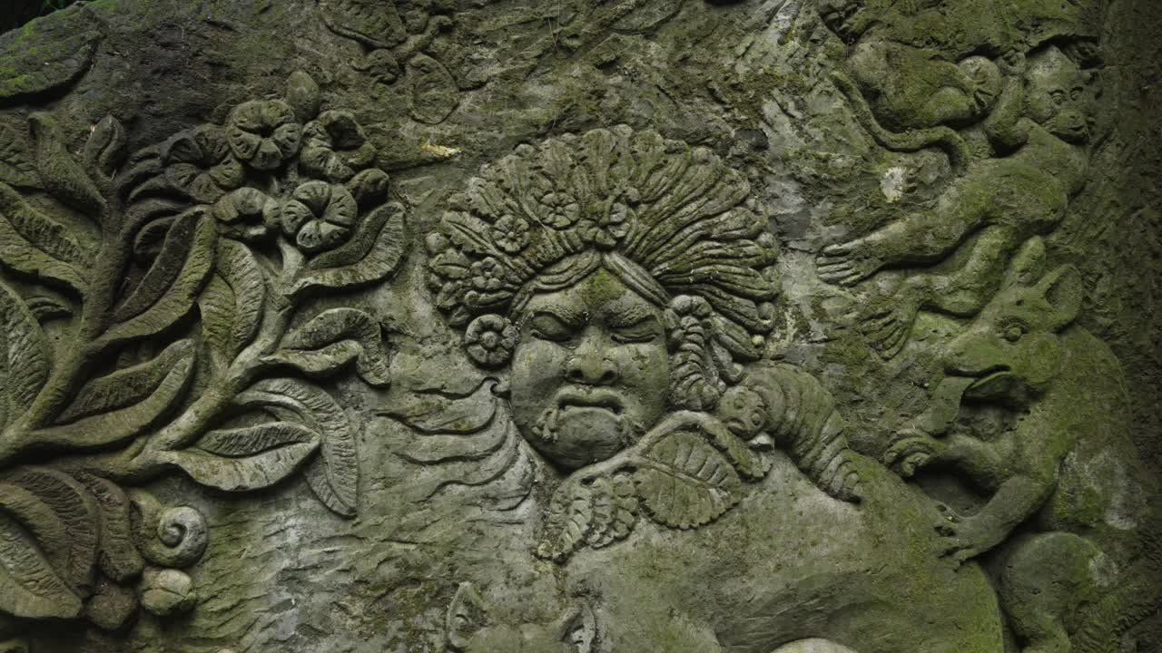Ancient Balinese mythology sculpture carving in stone Bali Ubud Indonesia