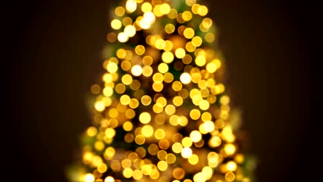 hermosas luces de árbol de año nuevo doradas parpadeando en un bokeh borroso desenfocado. fondo de saludo animación 3d sin fisuras. feliz navidad y feliz concepto de celebración de año nuevo.