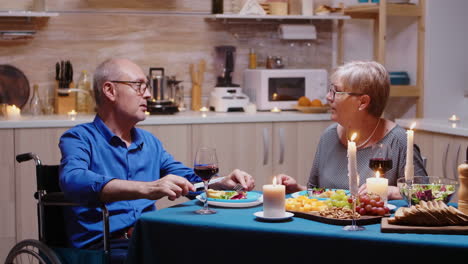 man with disabilities having dinner