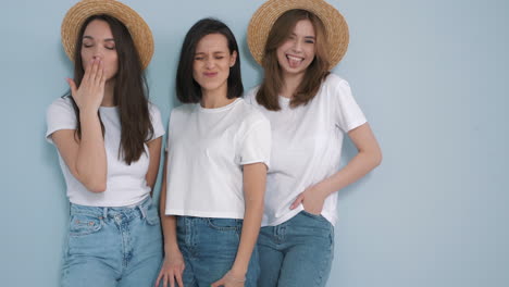 three women friends laughing