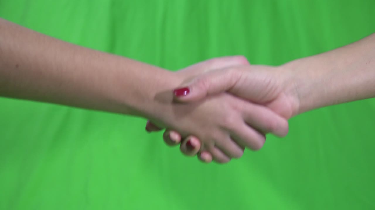 gesto de la mano apretón de mano con pantalla verde