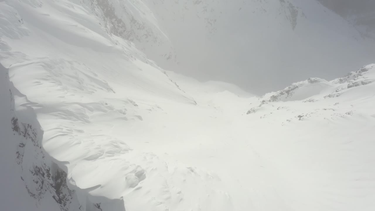 Impressive steep snowy slopes in the Canadian mountains after a snowstorm