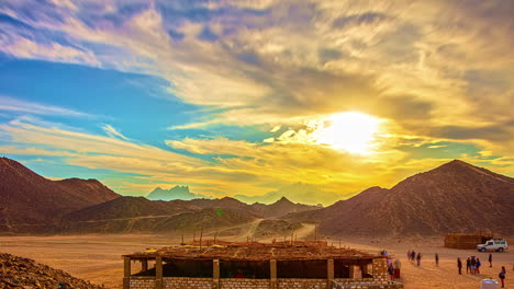 workers at the construction site near mountainous landscape on a sunny day