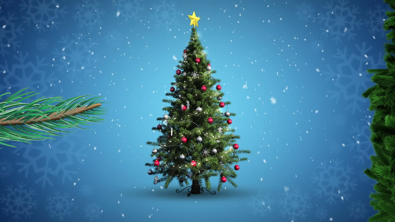 Animação de árvore de Natal girando e neve caindo em fundo azul