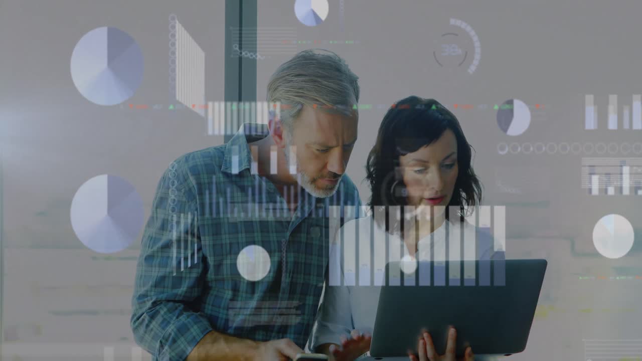 Animation of digital screen with diverse data over caucasian female and male coworkers in office