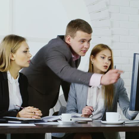 static shot of business colleagues at computer