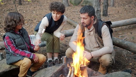 family camping trip by the campfire